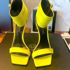 Versace
Safety Pin Ankle-Cuff Leather Sandals